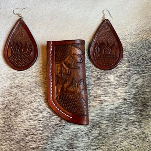 Knife sheath with earrings